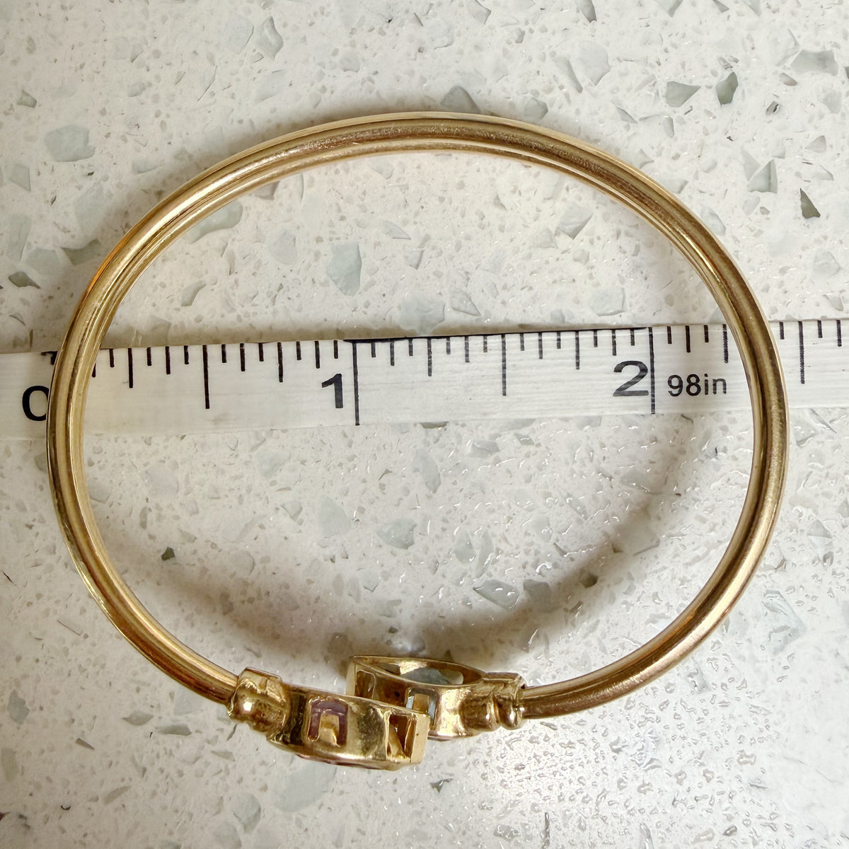 Vintage 14k yellow gold twist/swivel open amethyst and topaz bangle