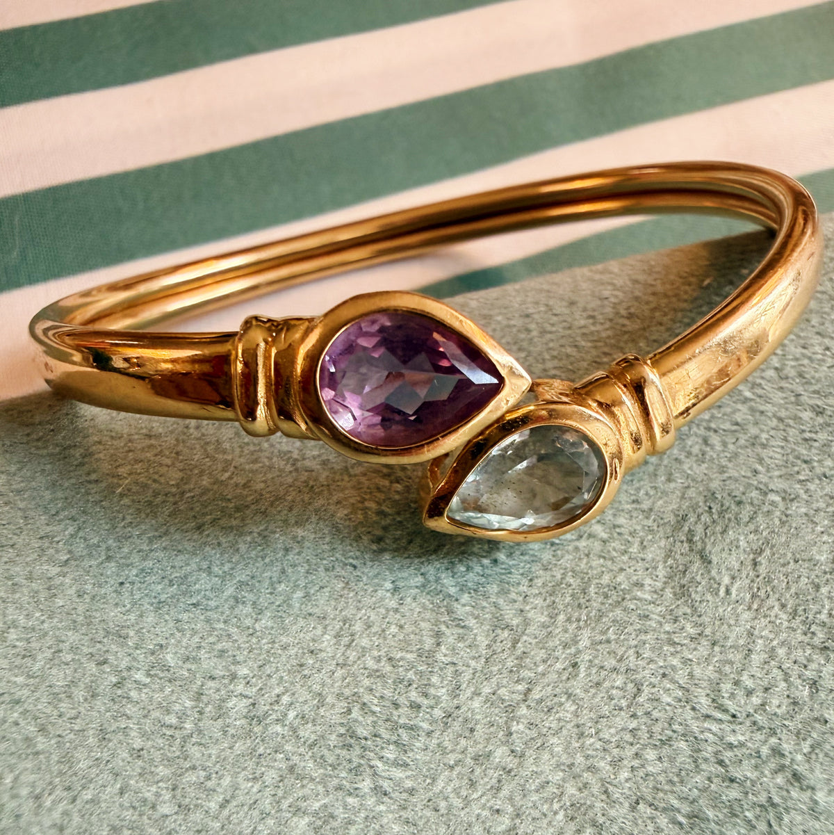 Vintage 14k yellow gold twist/swivel open amethyst and topaz bangle