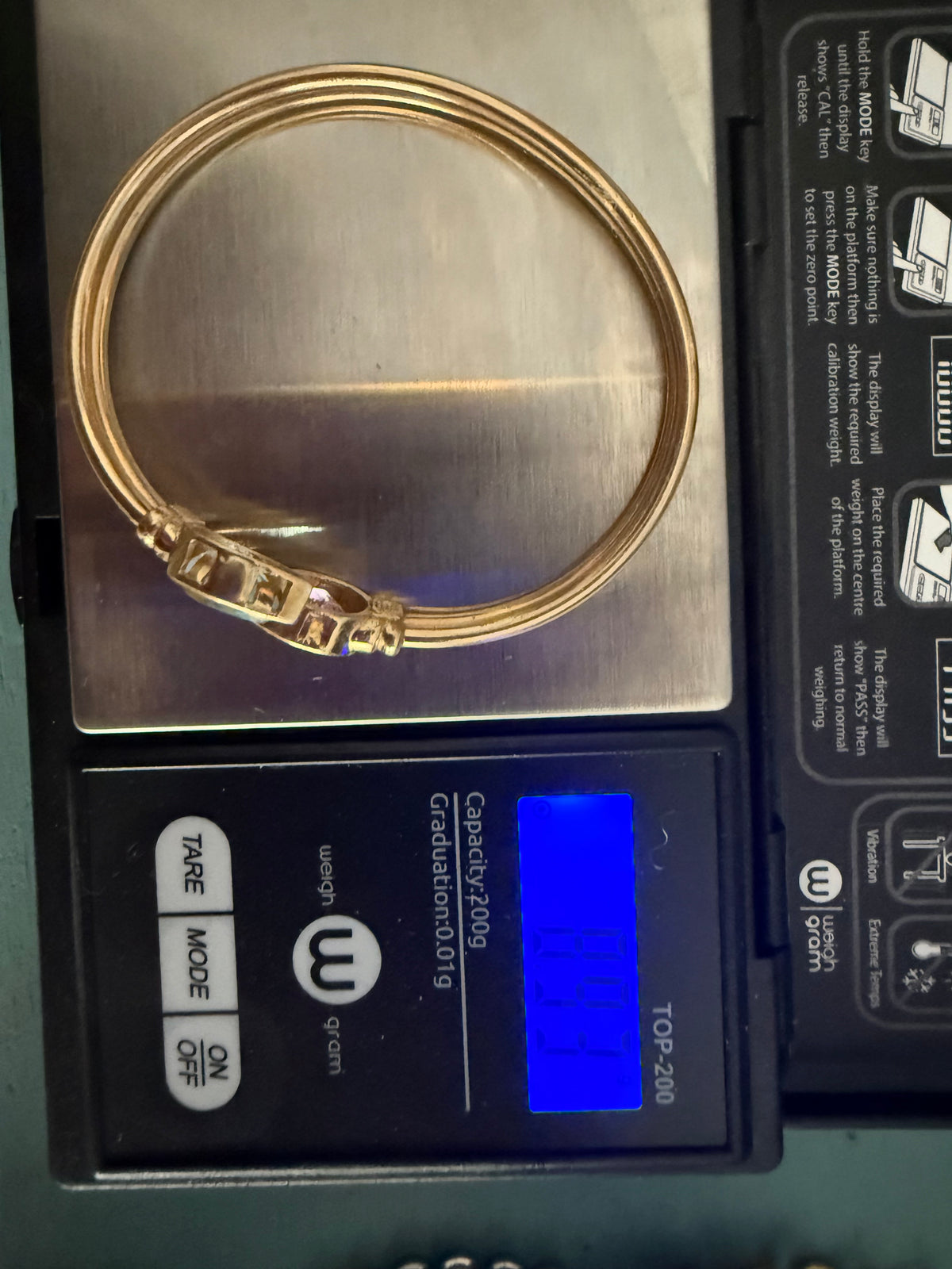 Vintage 14k yellow gold twist/swivel open amethyst and topaz bangle