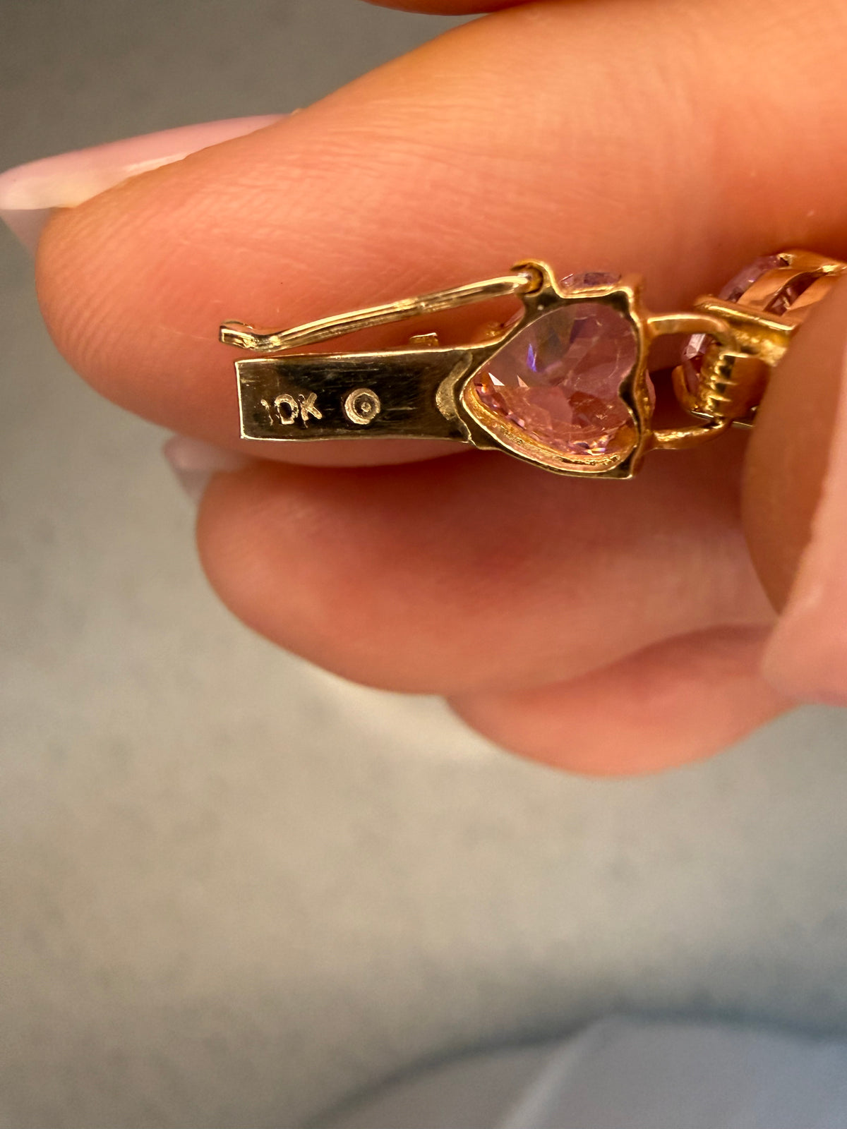 10k yellow gold pink heart CZ tennis bracelet 7”