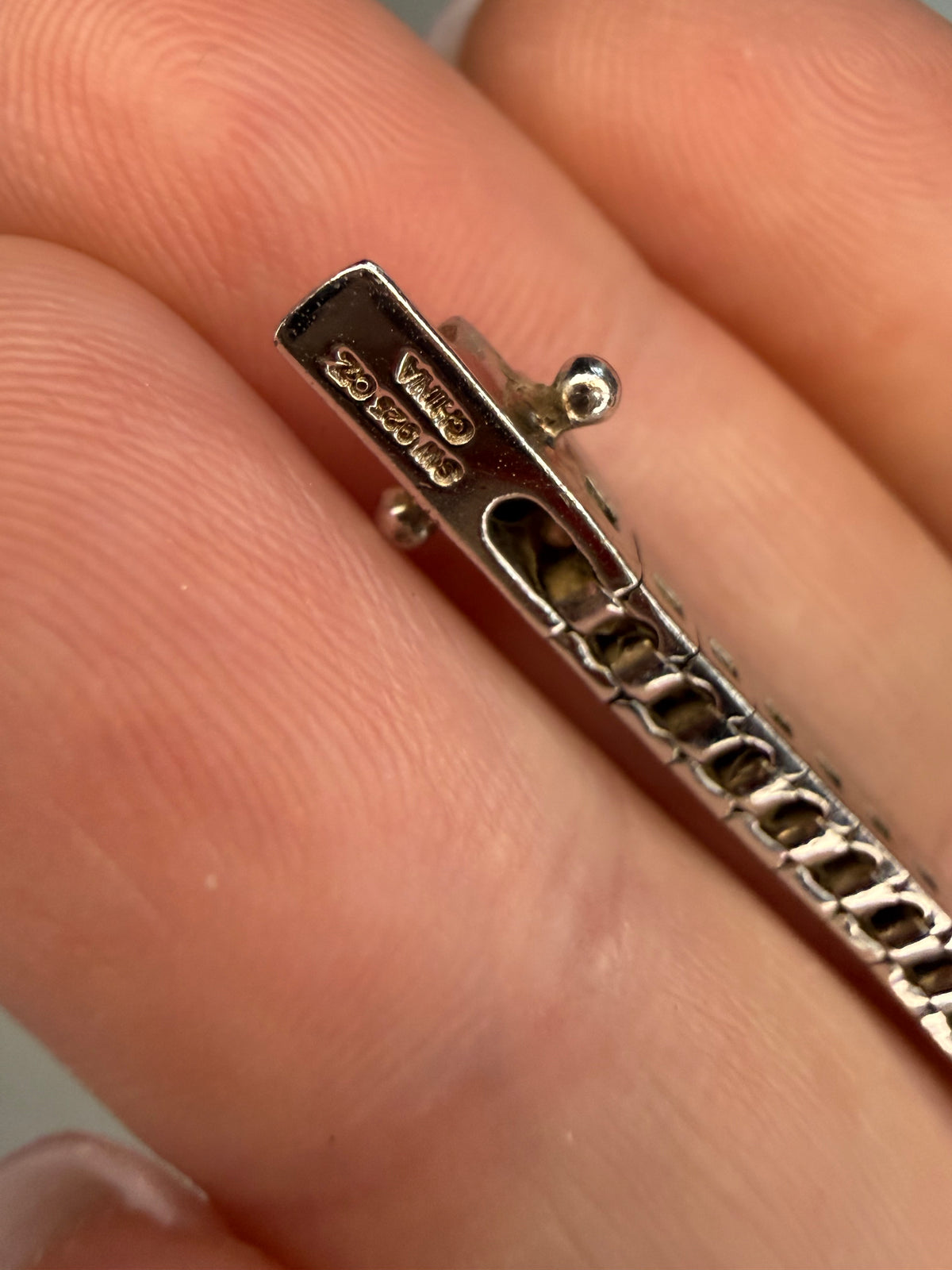 Sterling silver round CZ half bezel set tennis bracelet 6.5”