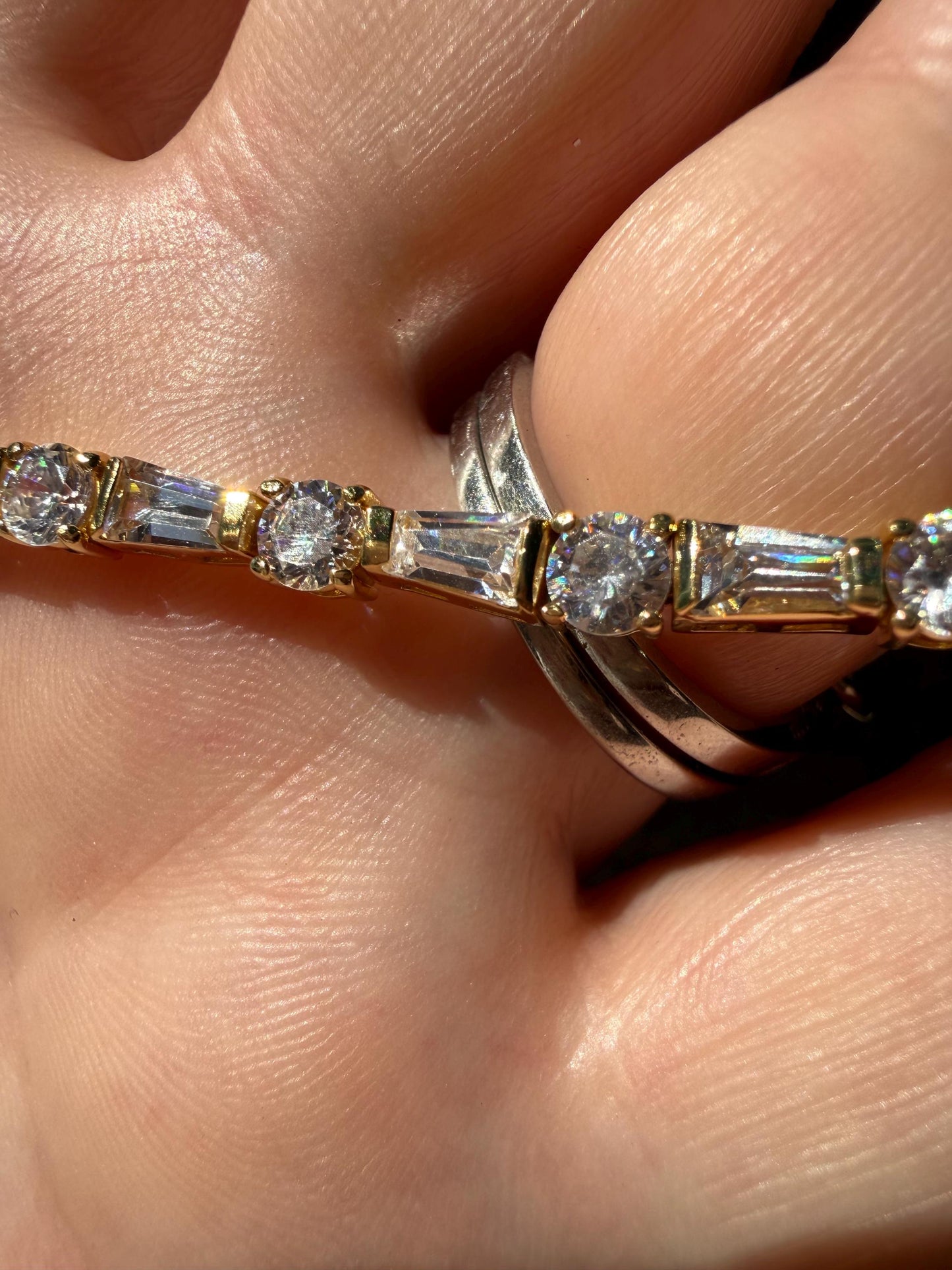 Sterling silver round and baguette CZ tennis bracelet 6.25”