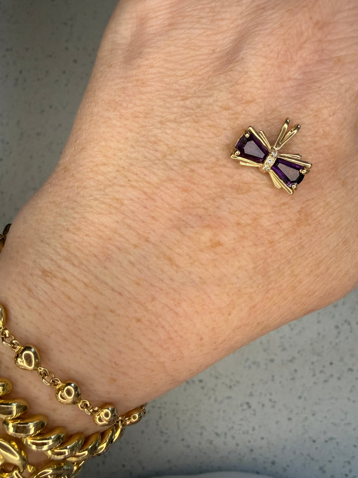 14k yellow gold amethyst bow charm/pendant