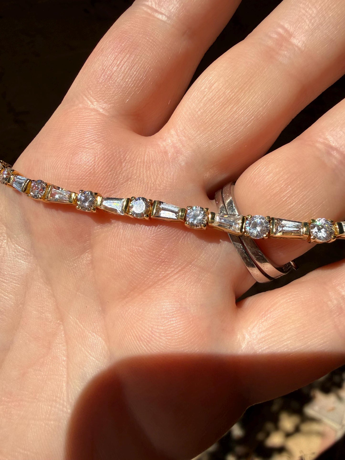 Sterling silver round and baguette CZ tennis bracelet 6.25”