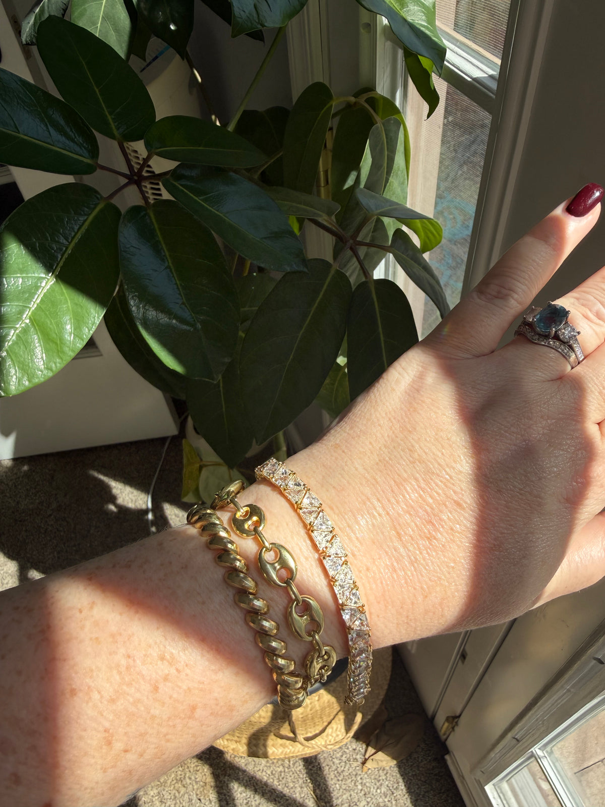 Gold over Sterling Silver triangle/trillion cut CZ tennis bracelet