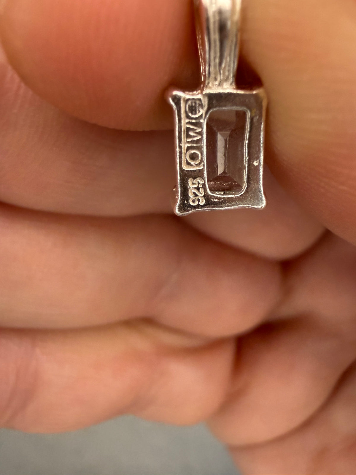 Sterling silver blue topaz emerald cut pendant