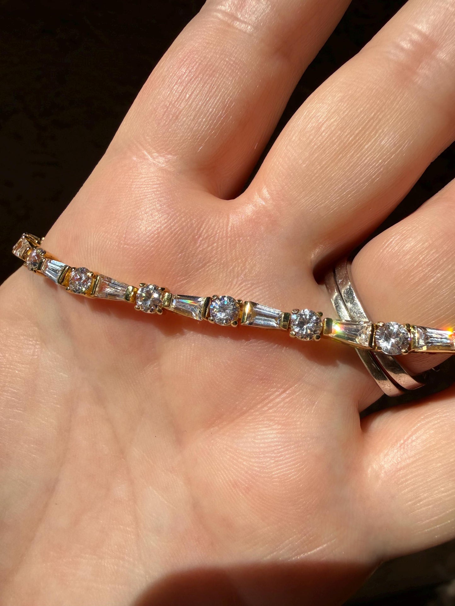 Sterling silver round and baguette CZ tennis bracelet 6.25”