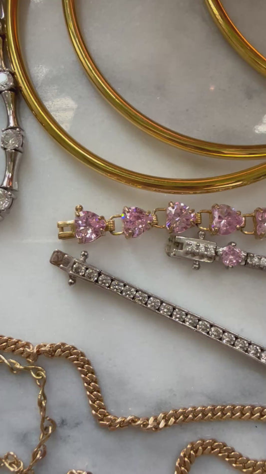 10k yellow gold pink heart CZ tennis bracelet 7”